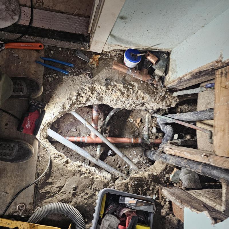 Copper slab water pipes exposed for repair work