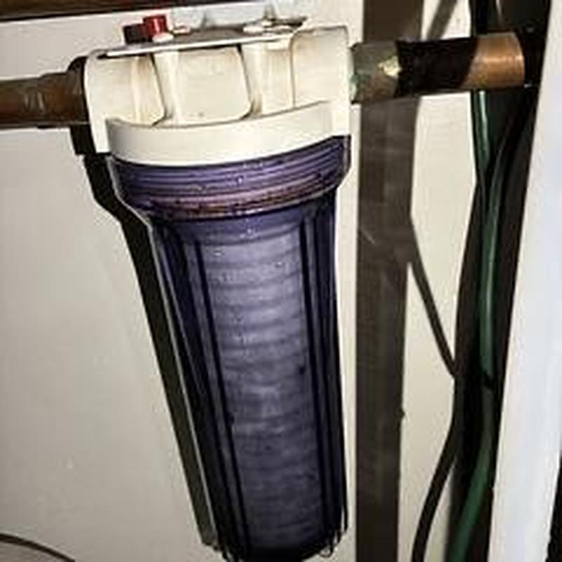 Sediment filter housing with connected copper piping