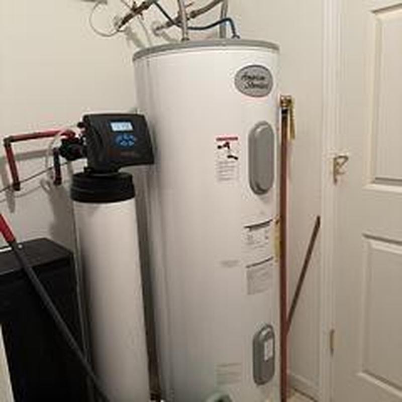 Electric water heater with thermal expansion tank installed