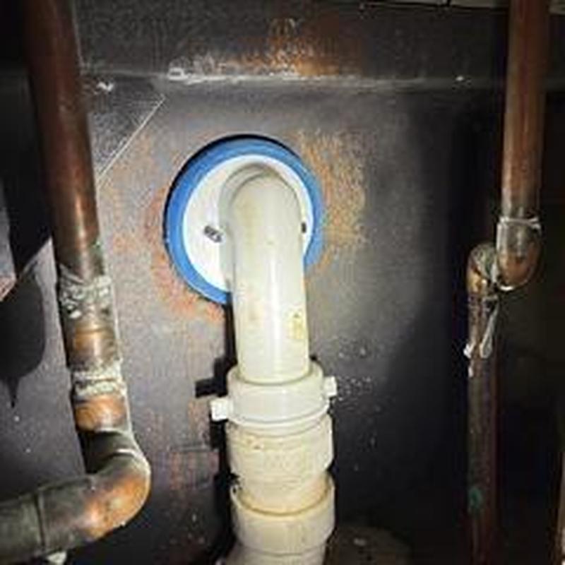 Master tub overflow drain with new pipe installation