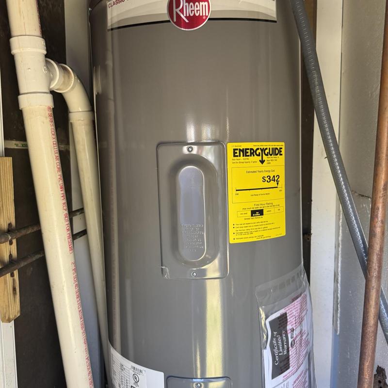 30 gallon electric water heater installation in utility room