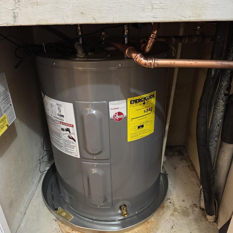 Low boy water heater with copper piping installation
