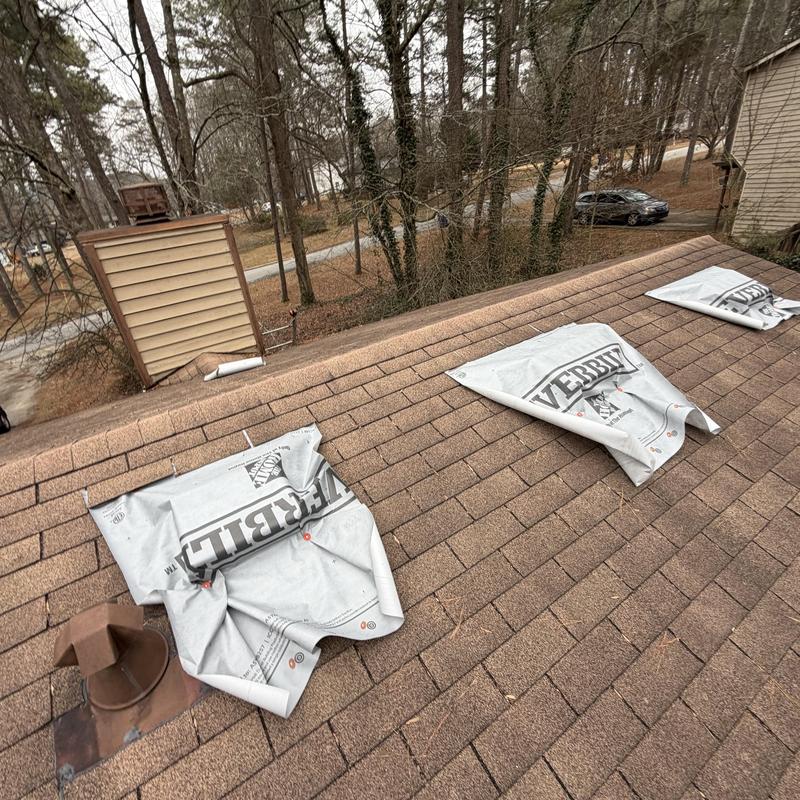 Box vents and pipe boot with tarps on shingle roof