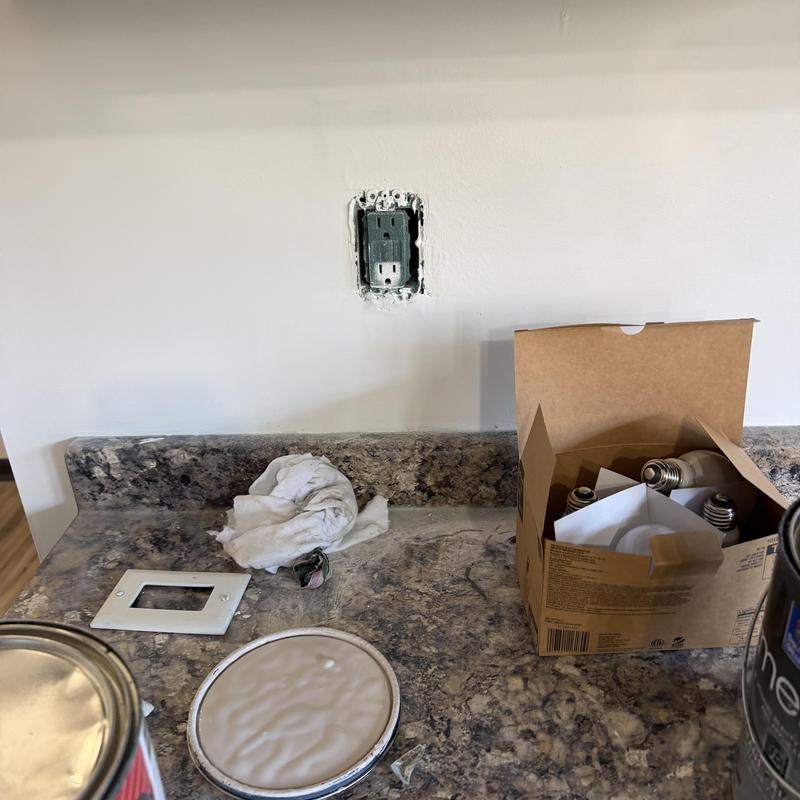Electrical outlet cover replacement on kitchen countertop Electrical outlet cover replacement on kitchen countertop