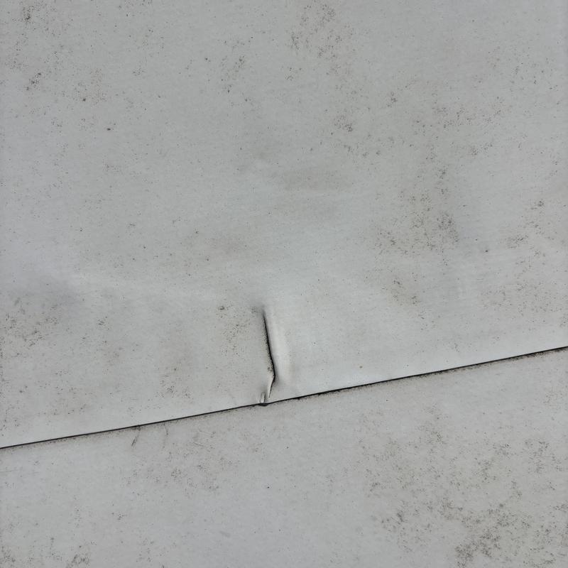 TPO roof membrane with small puncture defect