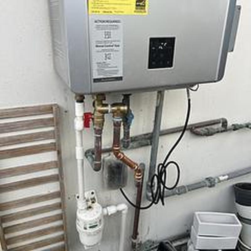 Tankless water heater with new recirculation pump installation