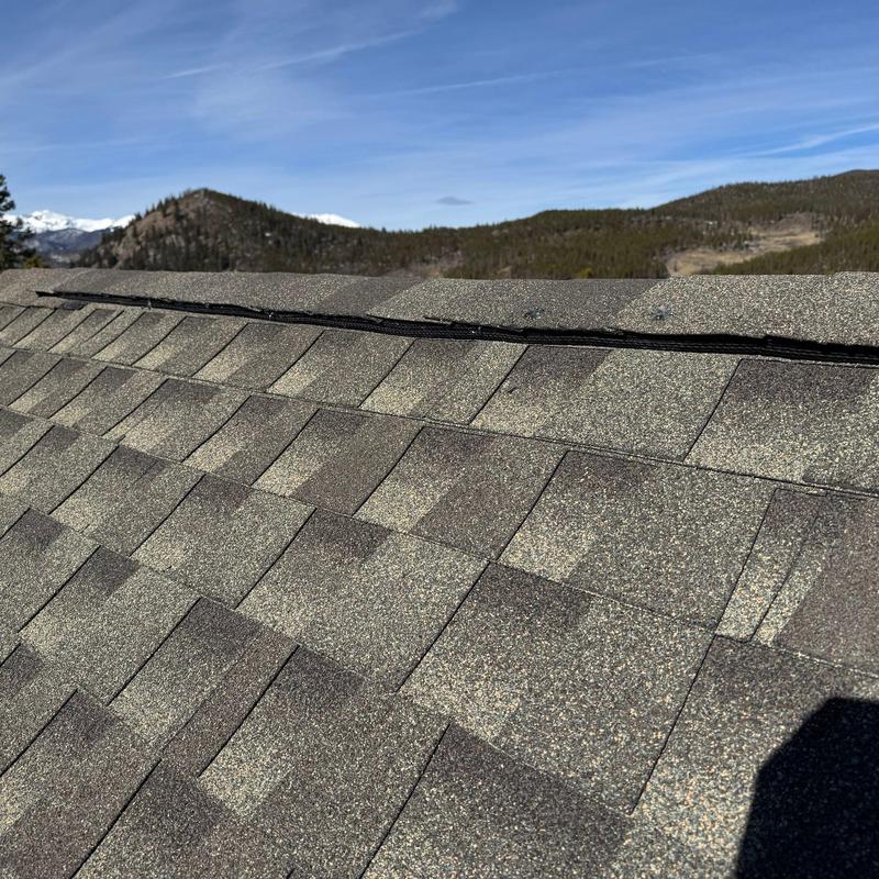 GAF Armorshield cap shingles on roof ridge ventilation