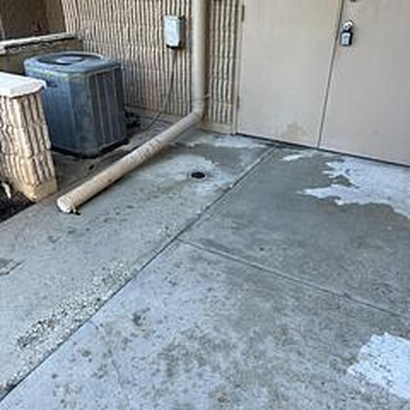 Bathroom cleanout drain with plumbing snake clearing stoppage