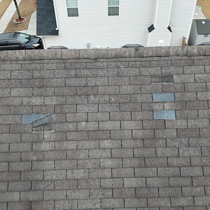 3-tab roof with missing replacement shingles
