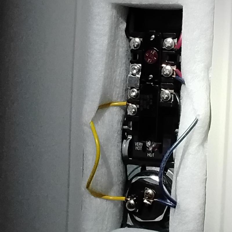 Water heater thermostat and element wiring close-up Water heater thermostat and element wiring close-up