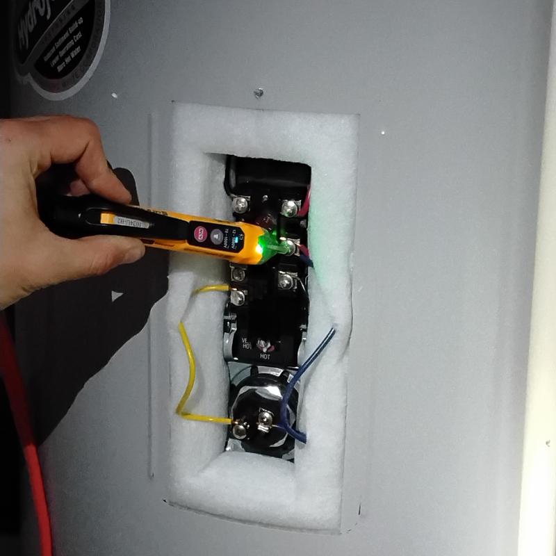 Water heater thermostat testing with voltage tester pen Water heater thermostat testing with voltage tester pen