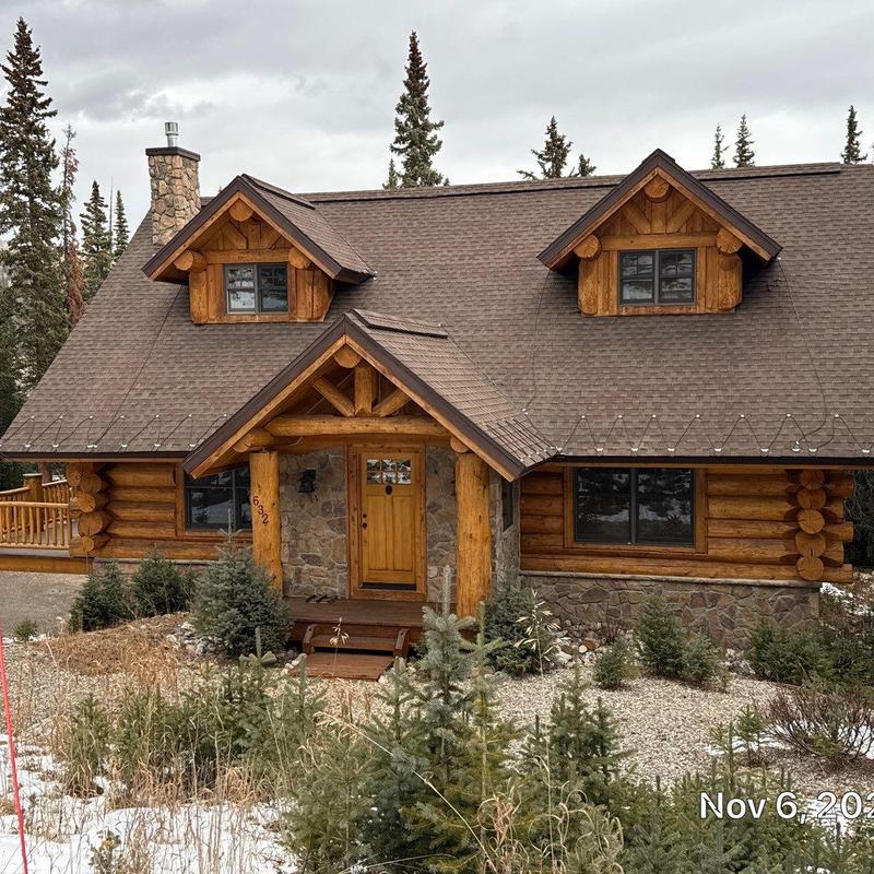 Asphalt shingle roof with heat tape pre-installation
