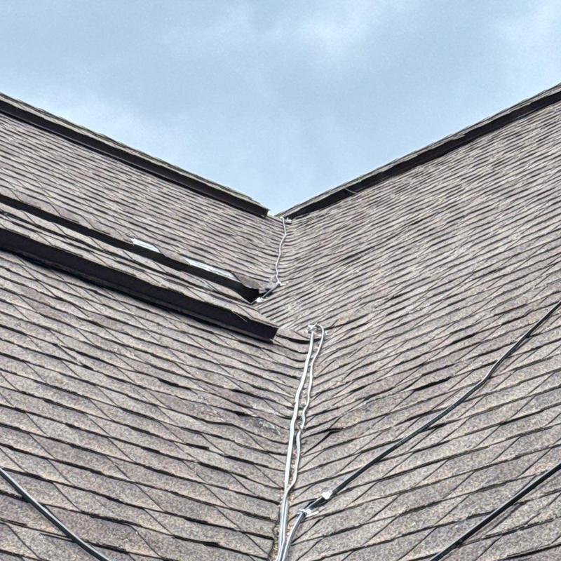 Asphalt shingle roof with heat tape wiring