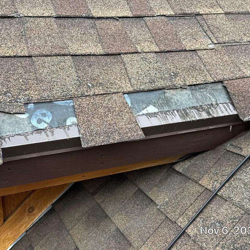 Asphalt shingle roof with damaged underlayment