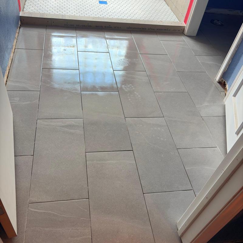 Gray porcelain bathroom floor tile installation Gray porcelain bathroom floor tile installation