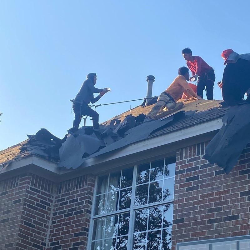 Roof decking replacement during shingle removal on house roof