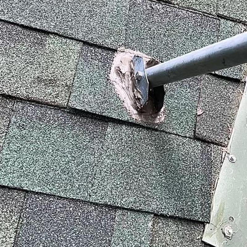 Roof pipe flashing with brace on asphalt shingles