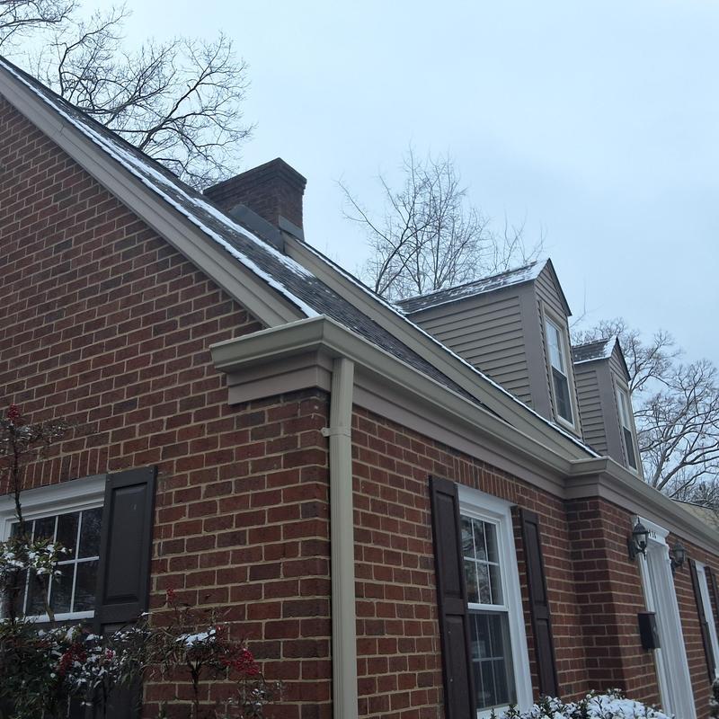 Atlas shingle roof on brick home with dormers
