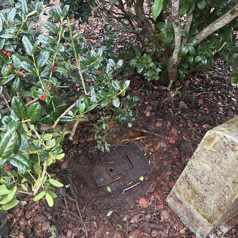 Underground valve box with soil and mulch restoration Underground valve box with soil and mulch restoration