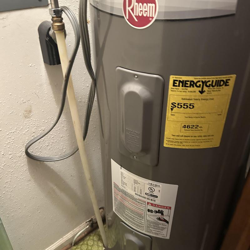 Electric water heater with replaced thermostats