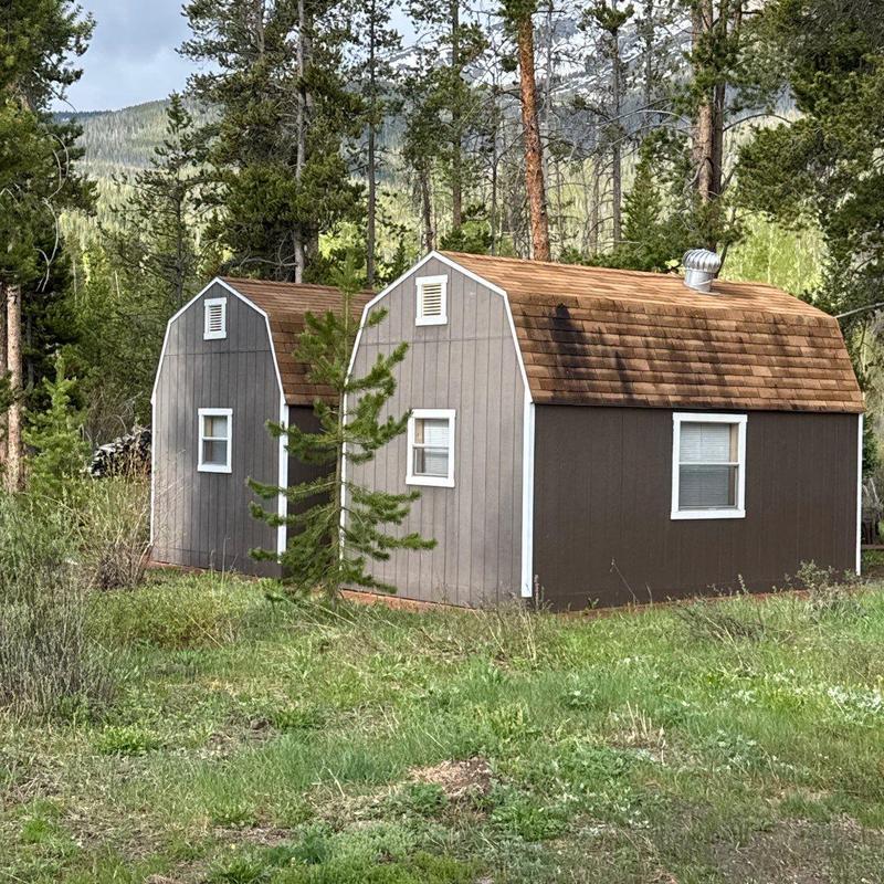 Asphalt shingle roof inspection on storage sheds