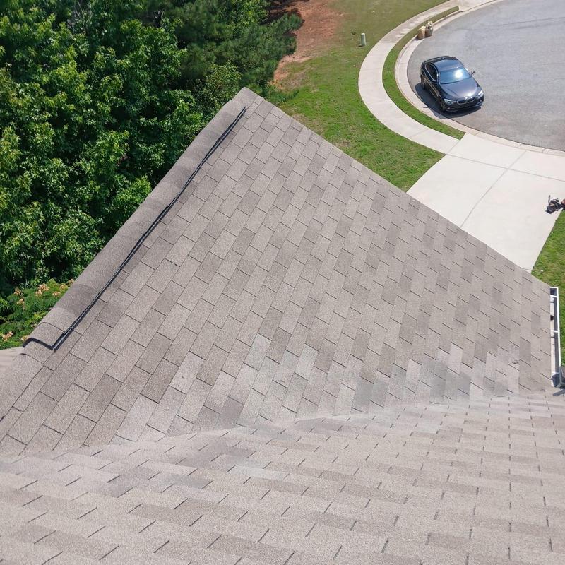 Asphalt shingle roof valley with new flashing installed