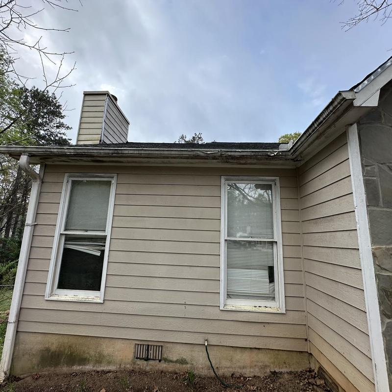 Steel gutter system rusting and failing on house front