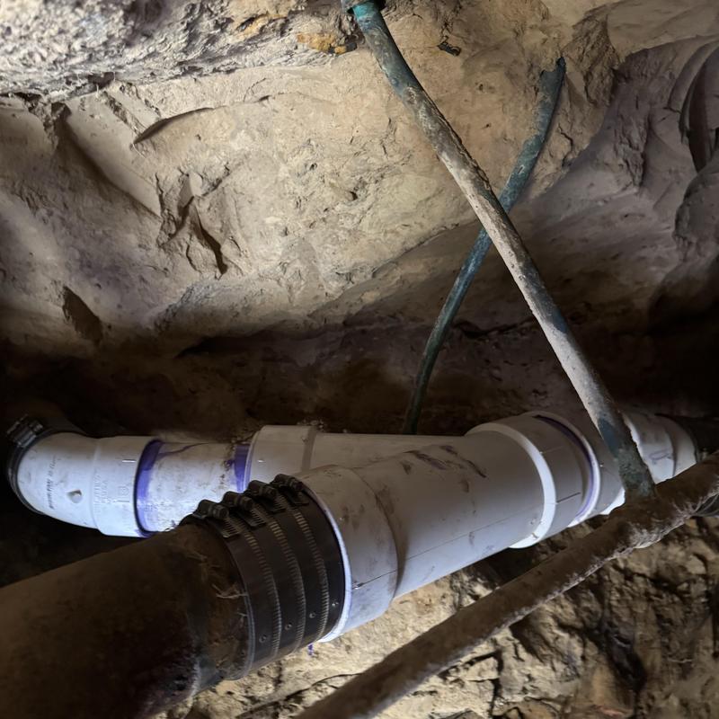 PVC sewer pipe replacement with rubber couplings underground