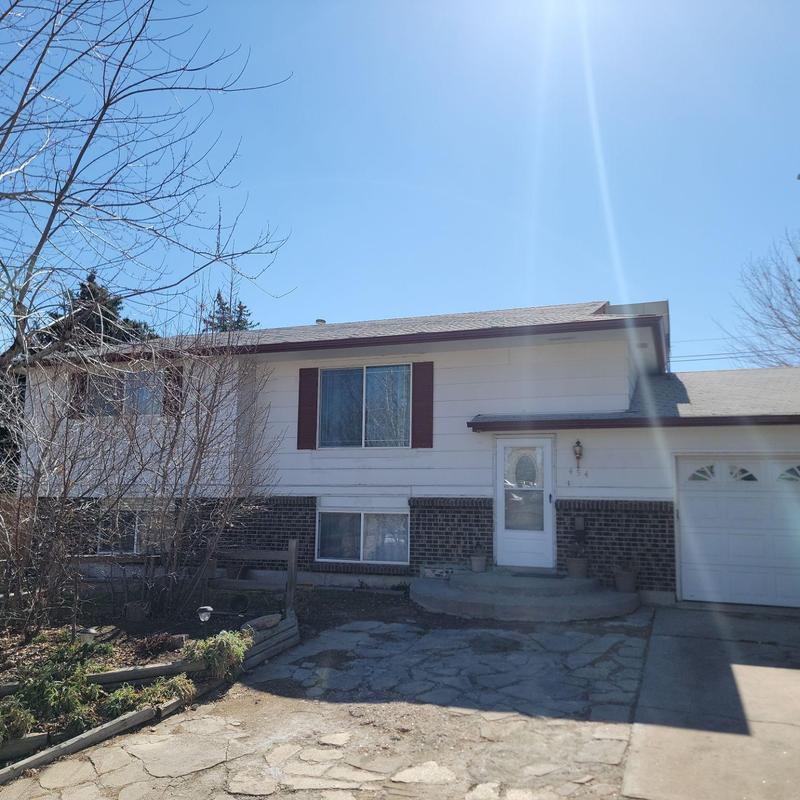 Roof shingles with hail damage on residential house Roof shingles with hail damage on residential house