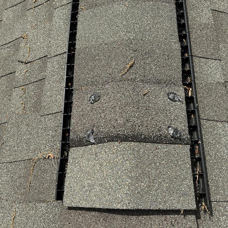 Ridge cap shingles with sealant and exposed nails