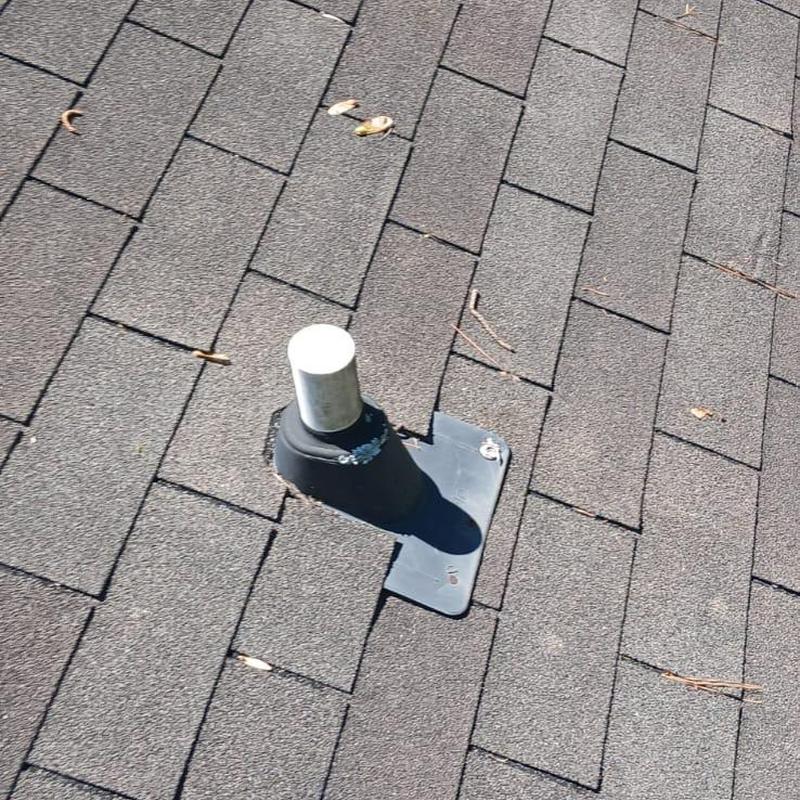 Pipe boot on shingle roof with new sealant