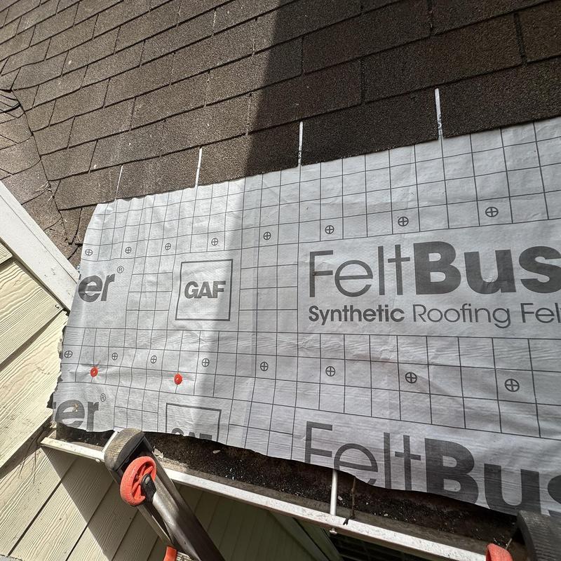 Synthetic roofing felt installation on roof section