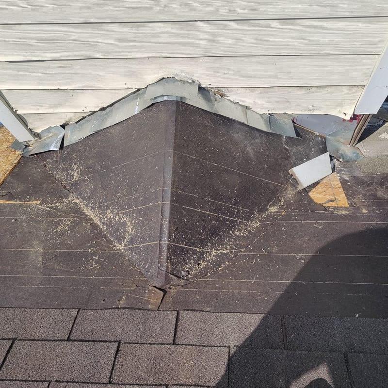 Roof valley with underlayment and damaged metal flashing