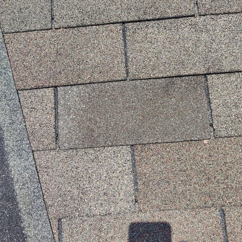 Shingles replacement with repaired pipe boot and caulking