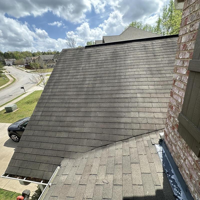 Asphalt shingle roof with mismatched sections