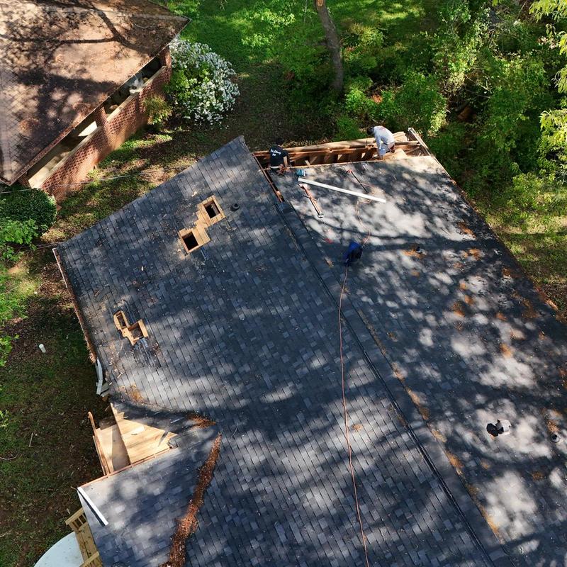 Roof decking and shingles replacement with ridge vent repair