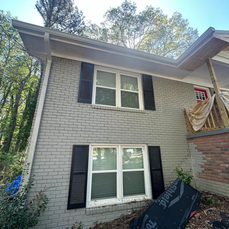 Gutter and fascia replacement on house exterior