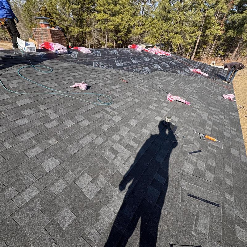 Asphalt shingle roof installation on residential home