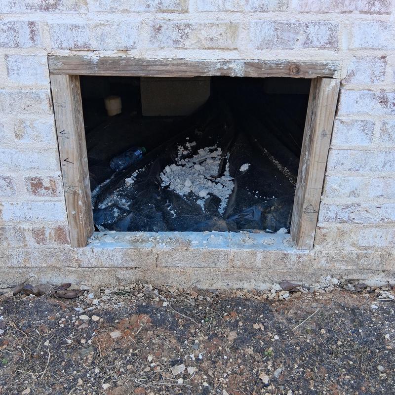 Custom access door frame in brick trailer skirting Custom access door frame in brick trailer skirting