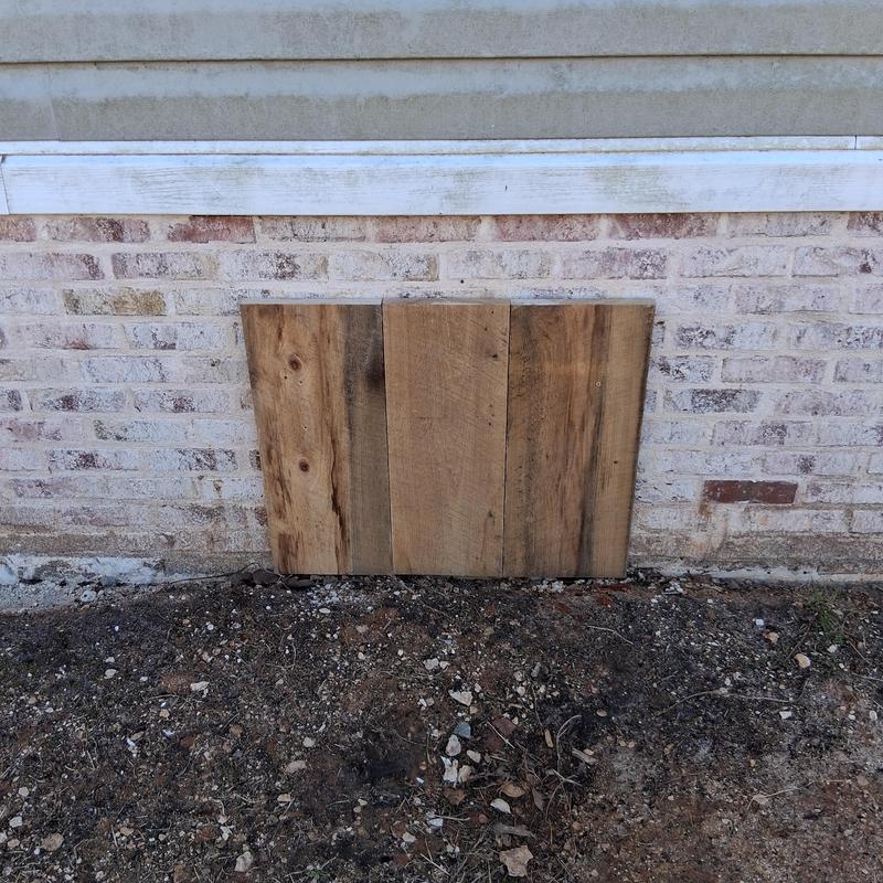 Brick skirting access door on trailer exterior wall Brick skirting access door on trailer exterior wall