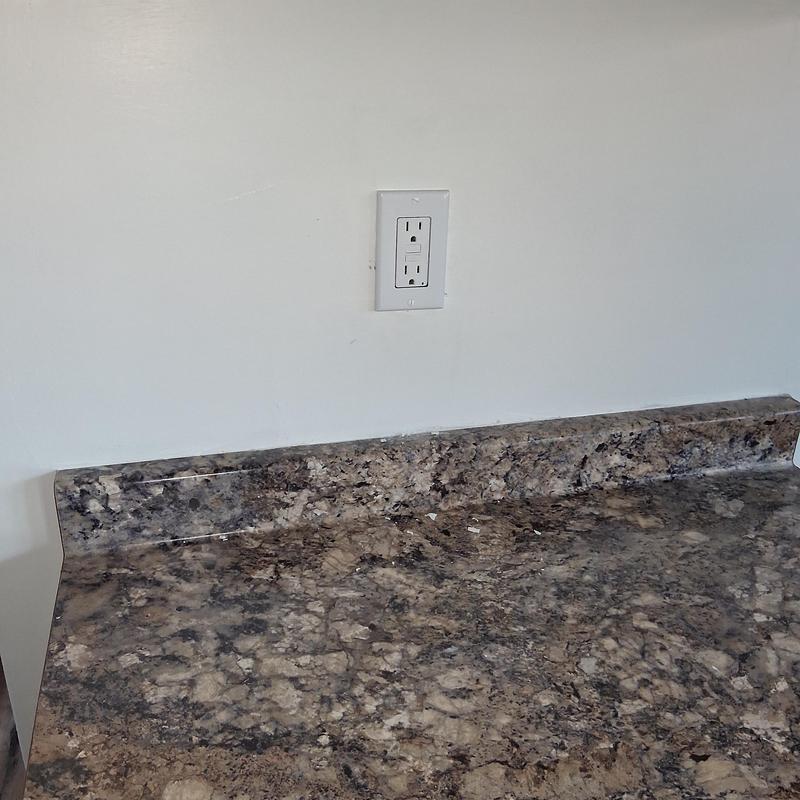 GFCI electrical receptacle on kitchen wall GFCI electrical receptacle on kitchen wall