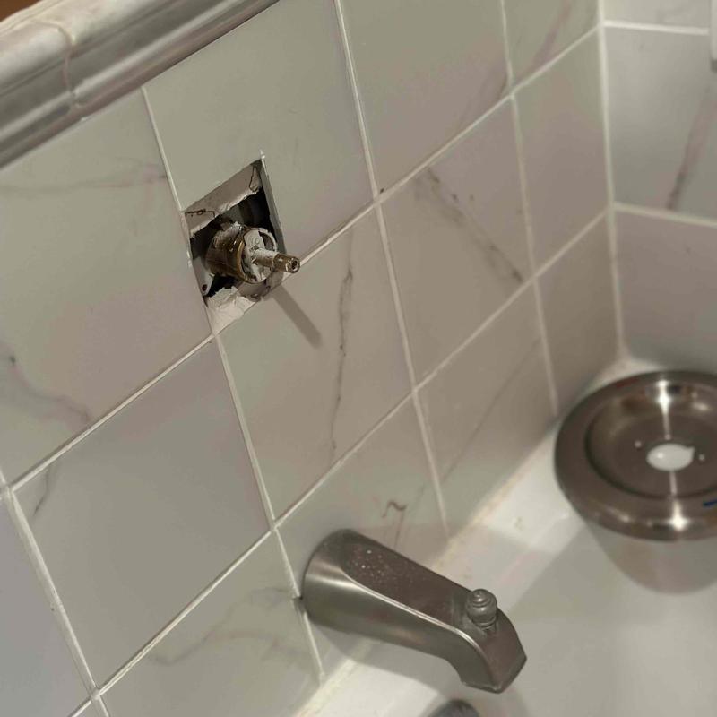 Shower cartridge replacement in tub faucet system