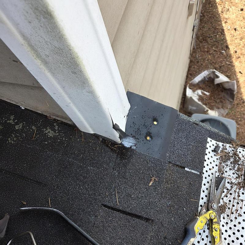 Wall flashing and roof shingles with caulking tools