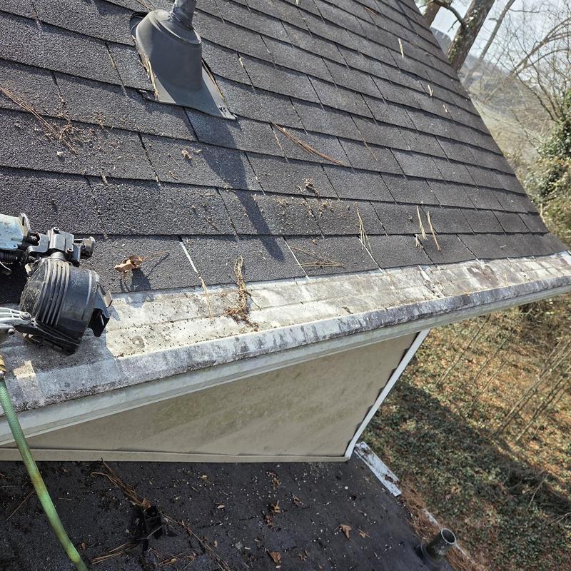 Wall flashing on shingle roof before re-flashing and caulking