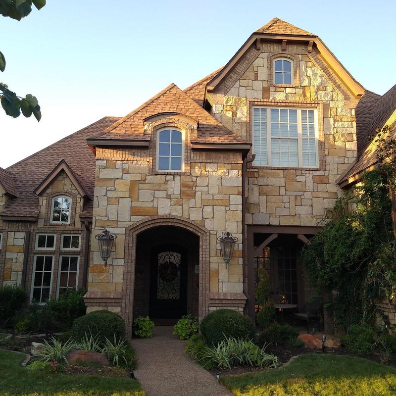 GAF Armorshield II Shakewood roof with new gutters