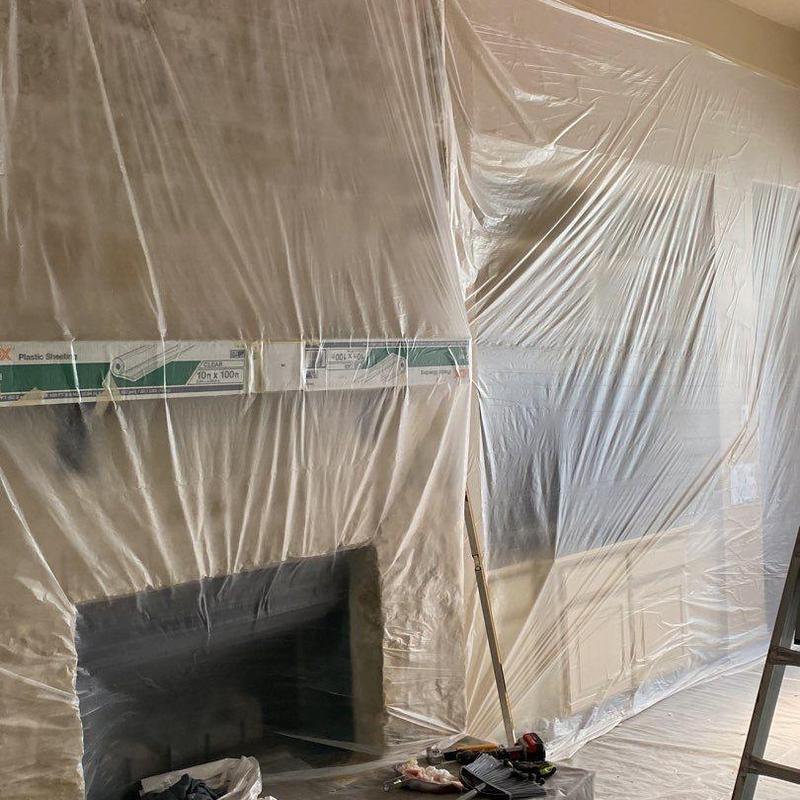 Ceiling drywall and insulation covered with plastic sheets