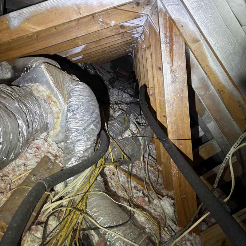 Hotline reroute piping over attic washing machine Hotline reroute piping over attic washing machine