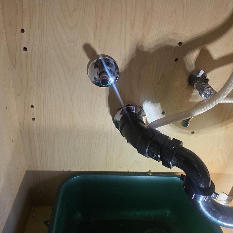 Leaking angle stops under sink with drain pipe nearby