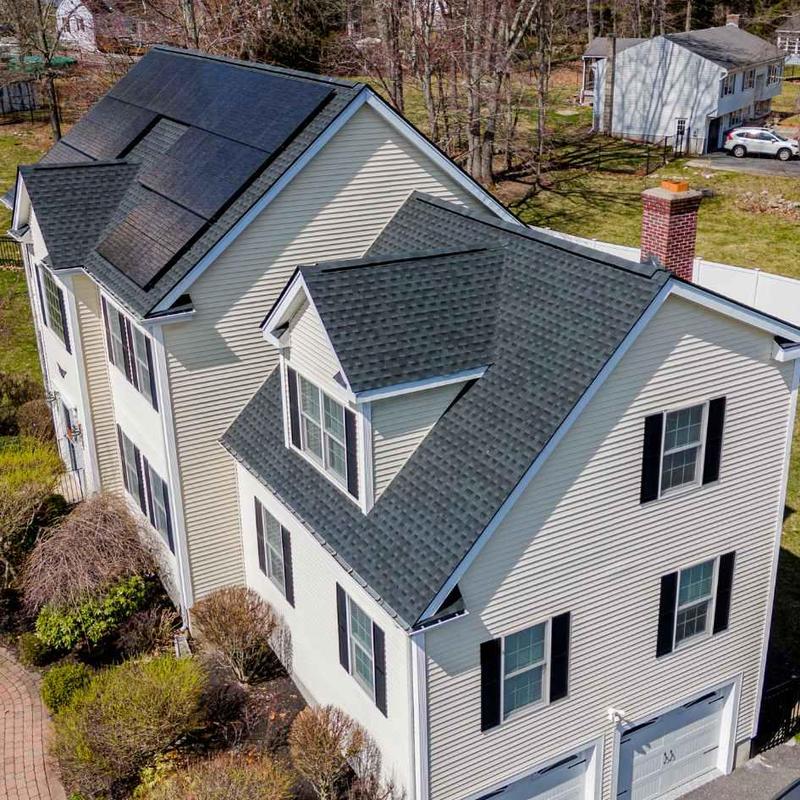 Owens Corning asphalt shingle roof with solar panels