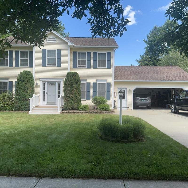 Asphalt shingle roof on two-story home in Milton, VT